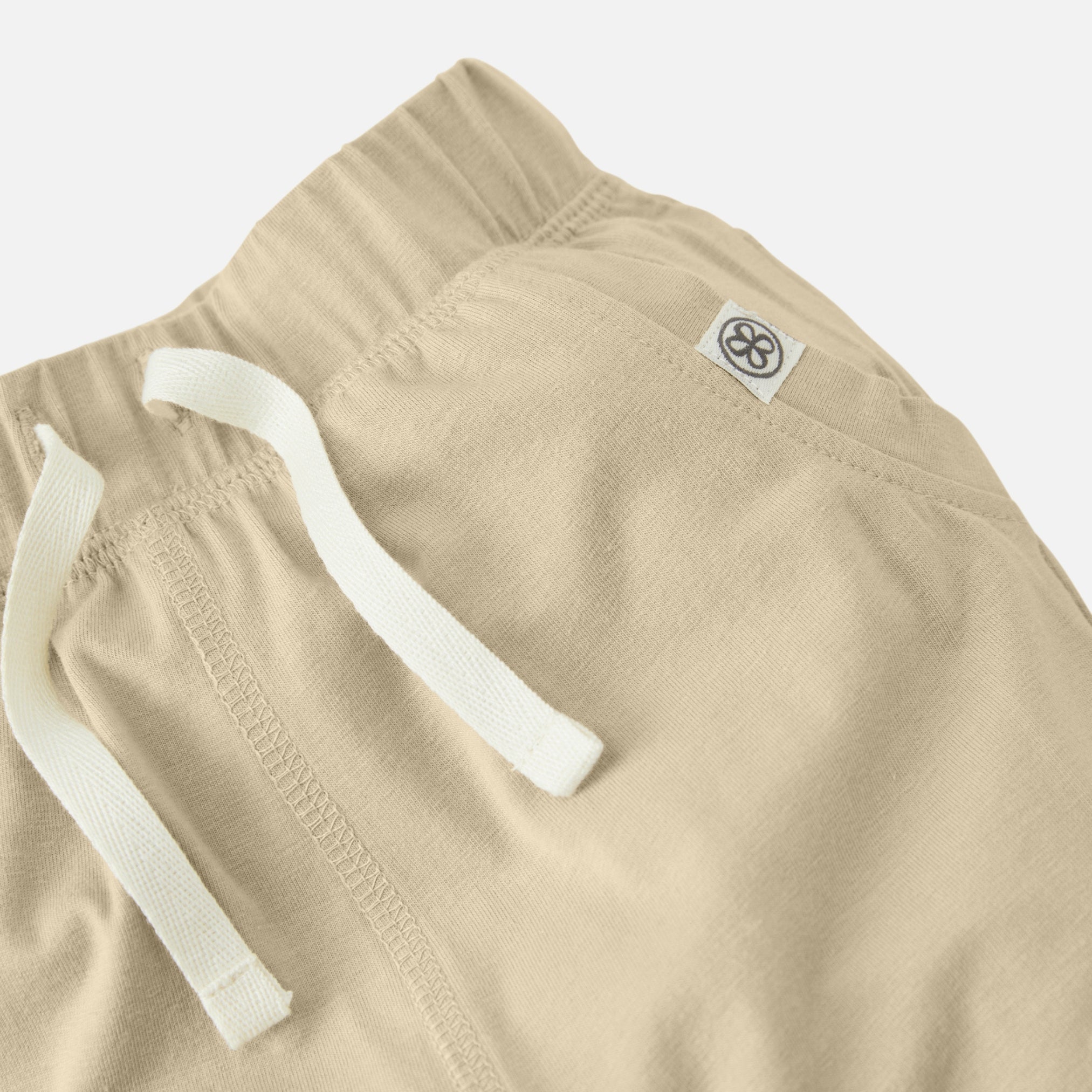 Details van joggers voor kinderen - Sandy Beach