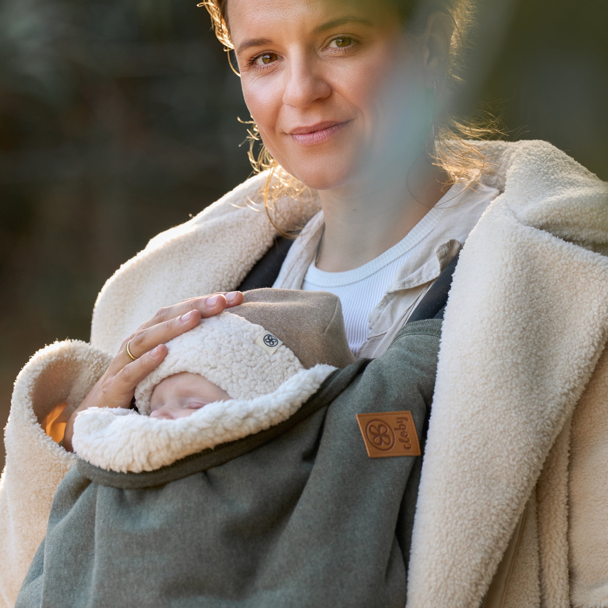 Teddy deken over draagzak